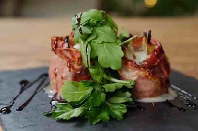 Roasted figs wrapped in parma ham